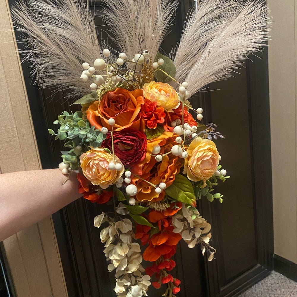 Vibrant Floral Bouquet with Orange and Red Roses